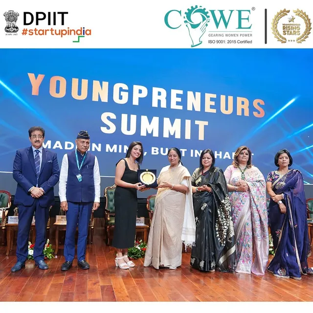A felicitation on stage at Youngpreneur Summit 2025